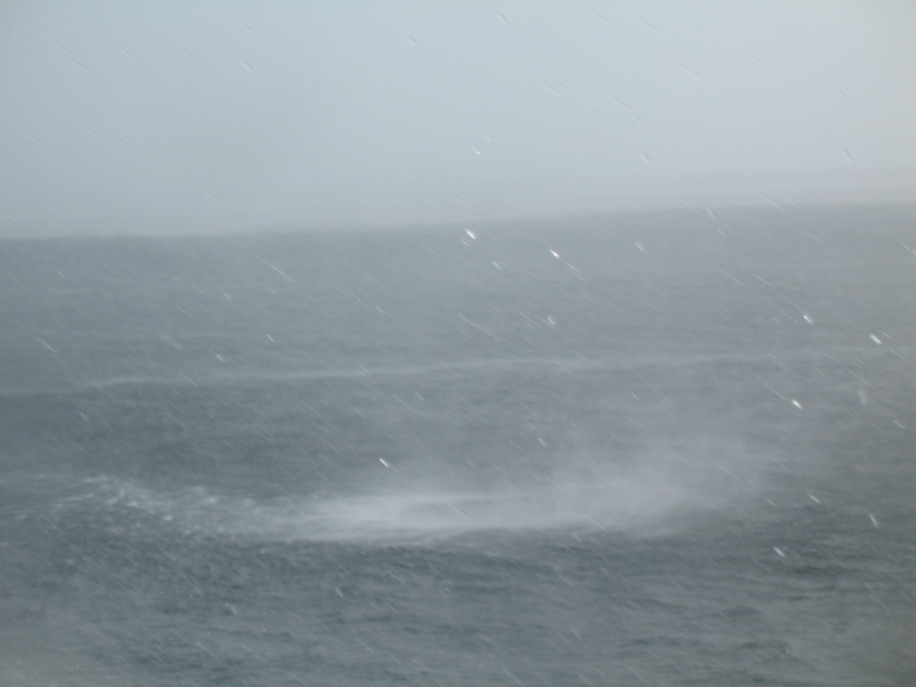 Waterspout sequence as the spray from a waterspout approaches the NOAA ShipGORDON GUNTER which is constrained in its ability tomaneuver as the recently launched TAO buoy is not yet anchored and is stillsecured by its mooring line to the ship