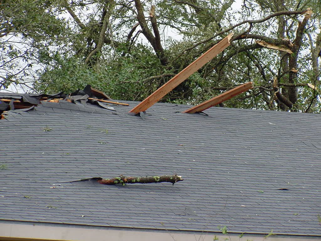 Roof impaled by flying debris during tornado