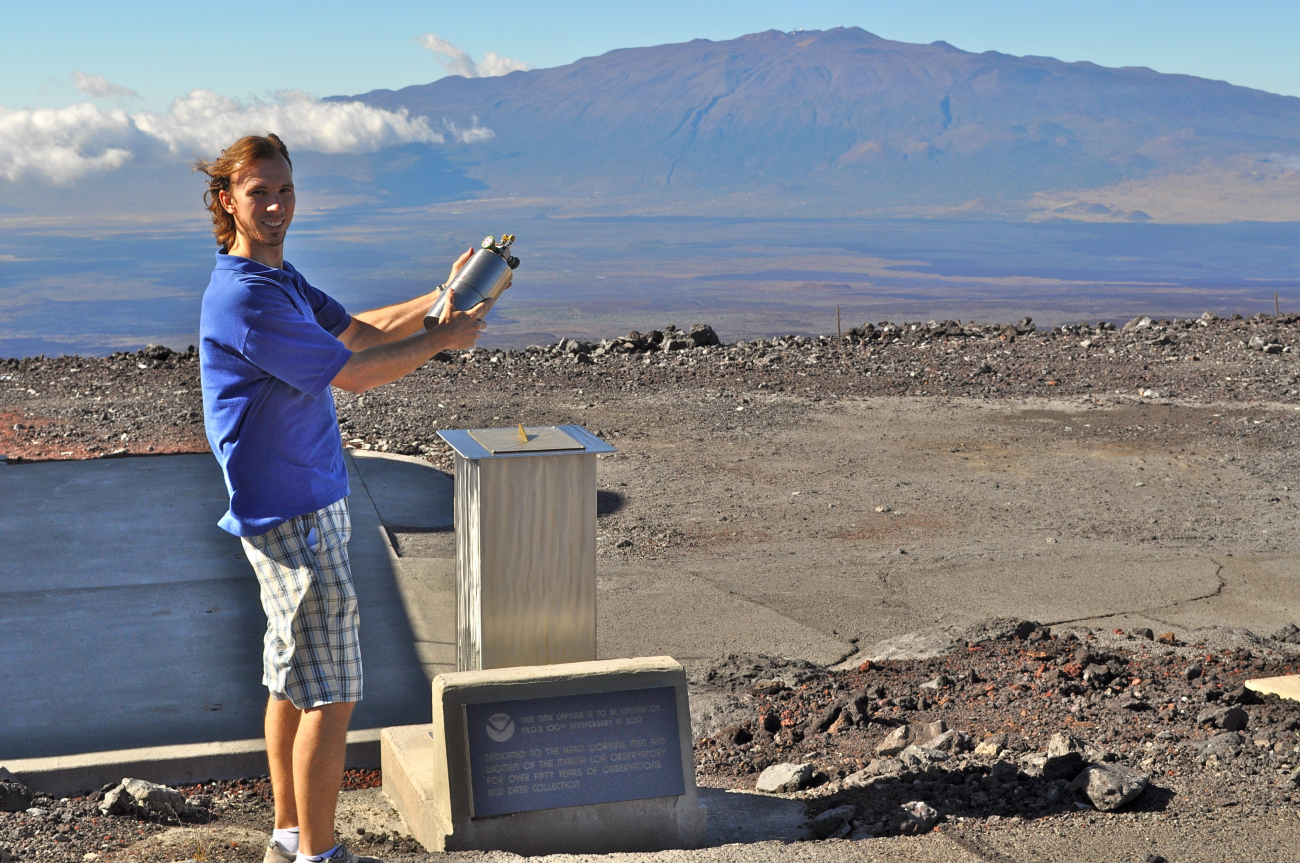 Adrian Colton at the Mauna Loa Observatory shows how early flask samples werefilled at the site