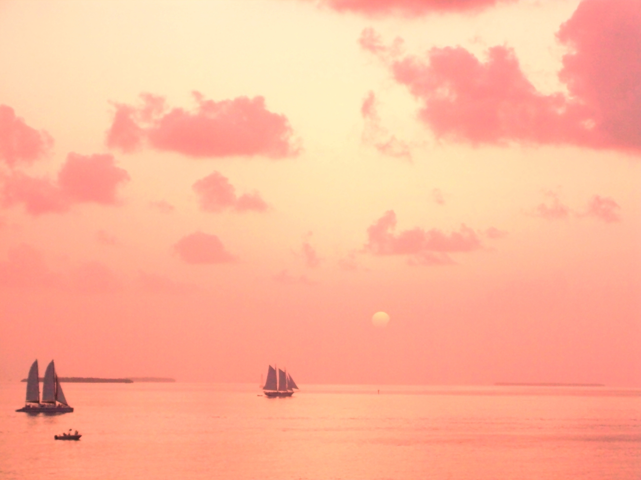 Sunset over the Gulf of Mexico - red sails in the sunset