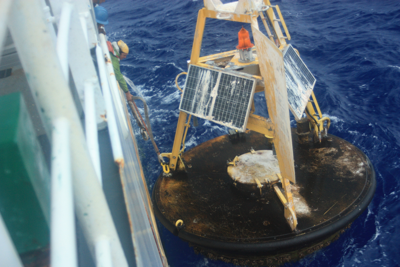 Recovering an adrift 3-meter weather buoy off the NOAA Ship Ka'imimoana