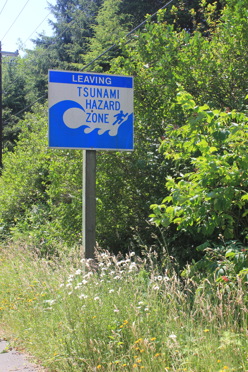 As one proceeds uphill away from the sea, a sign denotes Leaving TsunamiHazard Zone