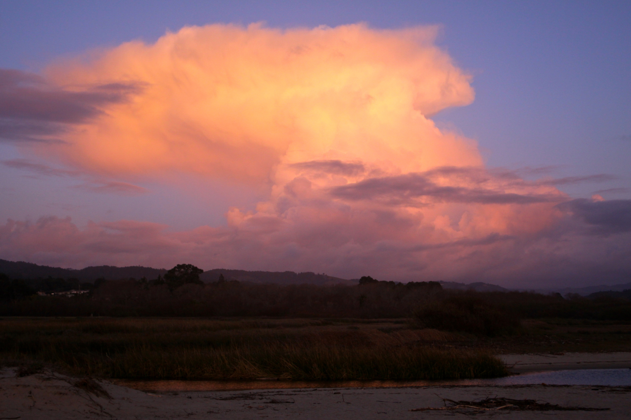 A thunderstorm seen from the mouth of Carmel River looking SE over the coastrange of mountains