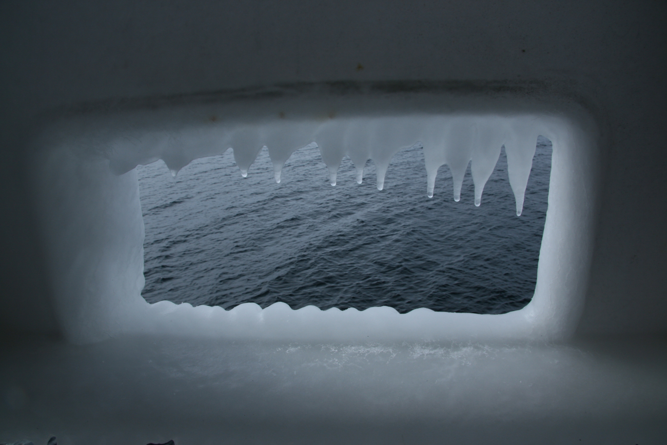 Icicles adorn this hawse hole on the NOAA Ship MILLER FREEMAN afterencountering icing conditions