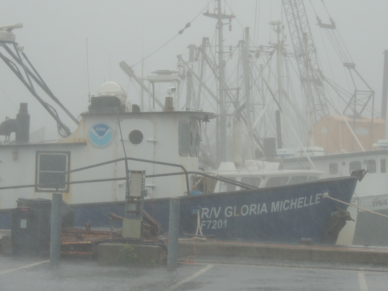 The NOAA R/V GLORIA MICHELLE tied up at Woods Hole on a foggy morning