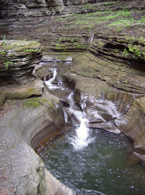 Babbling stream flowing into a bowl-like pool at Watkins Glen State Park