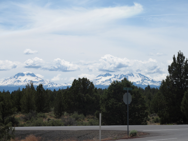 The Three Sisters with South Sister Peak on the left as seen from east ofSisters on Oregon Highway 126