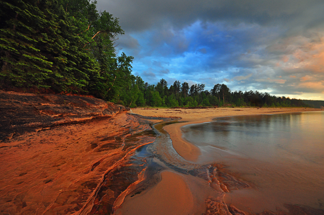 Miners Beach at Pictured Rocks National Lakeshore at sunset followingpassage of a thunderstorm