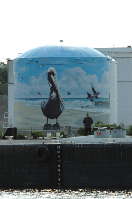 Pelican art on a fuel storage tank on the Cape Fear River