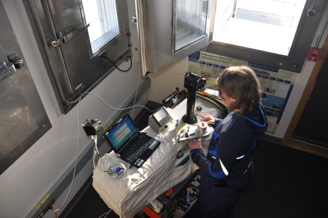 Scientist making Dobson Ozone measurements at Atmospheric ResearchObservatory