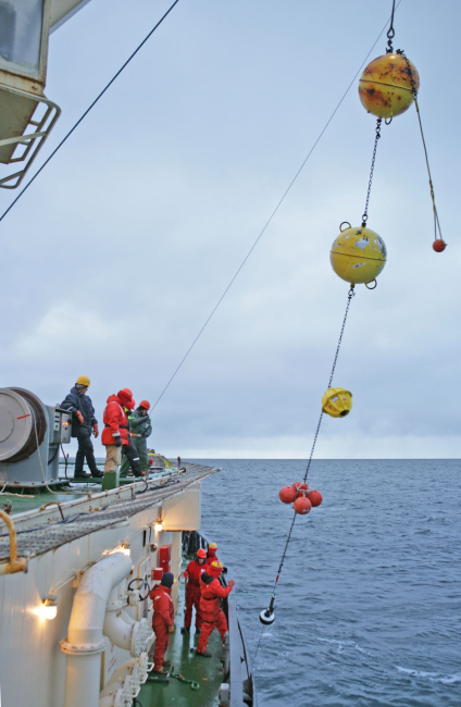 Recovering a deepsea mooring system that had been recordingchanges in temperature, conductivity, and other characteristics of ArcticOcean waters during the past year