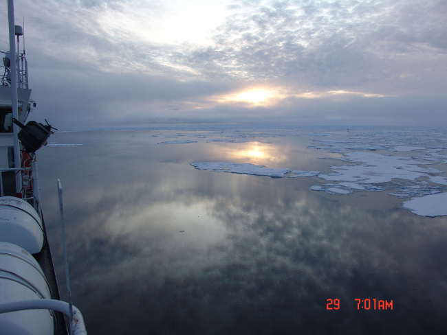 A mackerel sky reflecting off grease ice in a polynya