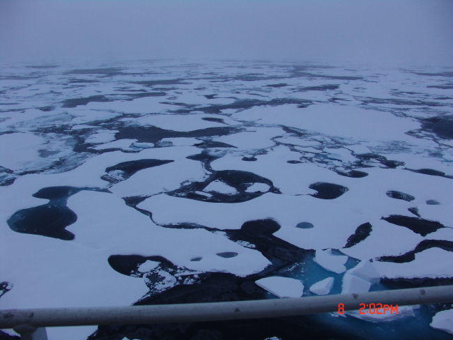 Melt pools freezing as floes begin coming together