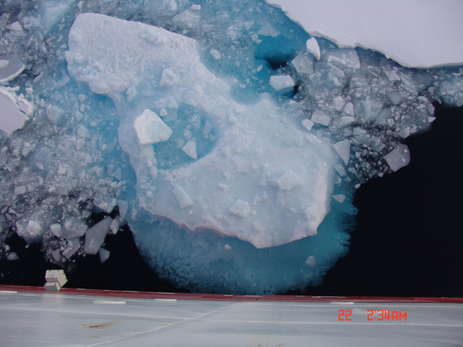 Small floe surrounded by brash ice