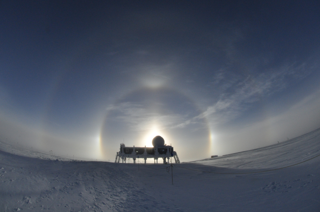 A halo is an optical phenomena caused by light interacting with ice crystals