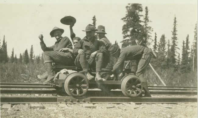 Members of triangulation crew of William Scaife in the interior of Alaska on avelocipede between Anchorage and Fairbanks