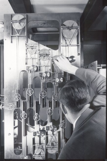 Adjusting various constituent gears for predicting tide at a specific locationon the surface of the earth