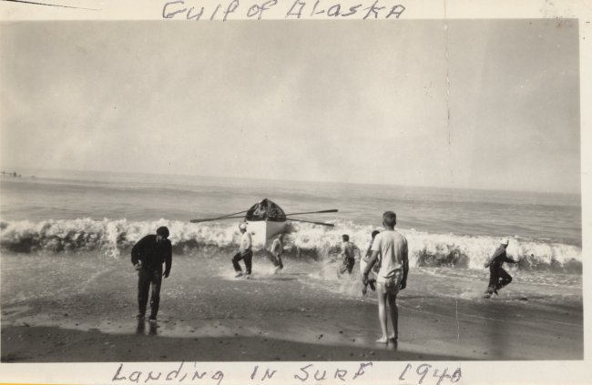 Whale boat landing (probably departing) in surf under oars - a lost art