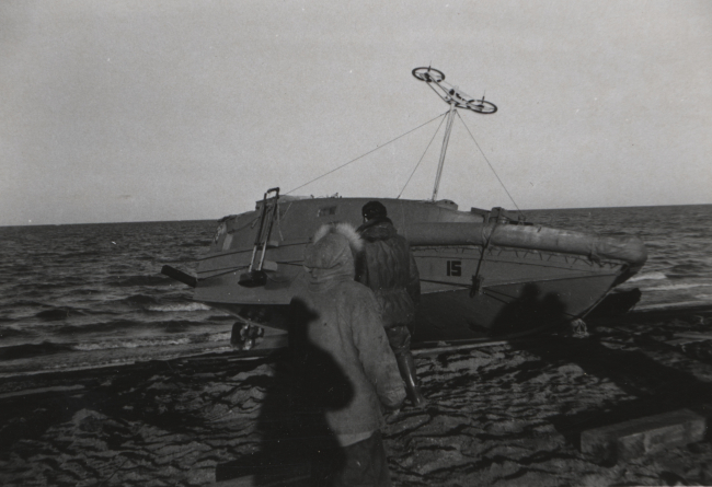 Launching survey boat with Shoran antenna