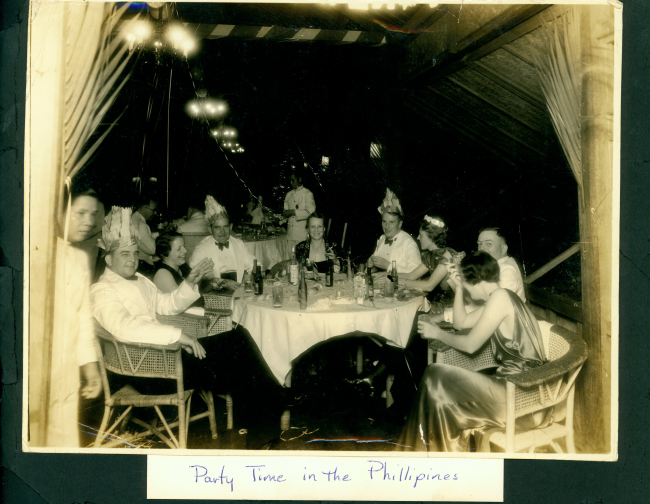Coast and Geodetic Survey officers and their wives at a New Year's Eve party,ca