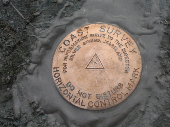 Freshly set Coast Survey horizontal control mark used in hydrographic surveyoperations