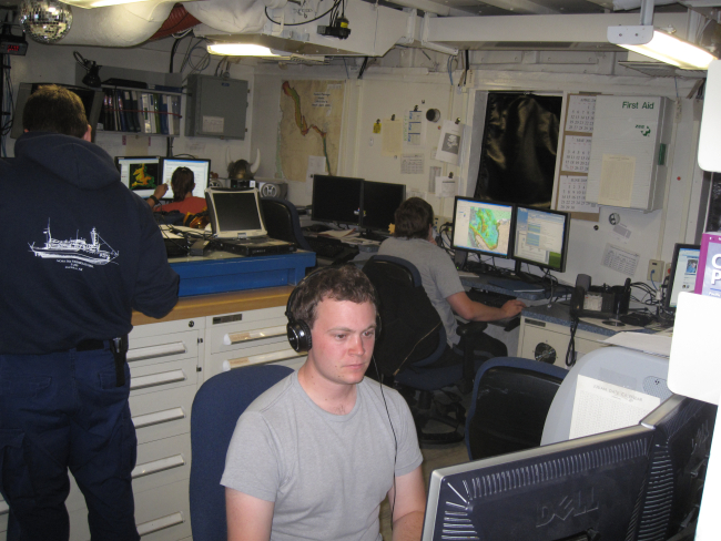 Processing survey data in the plot room of the NOAA Ship FAIRWEATHER