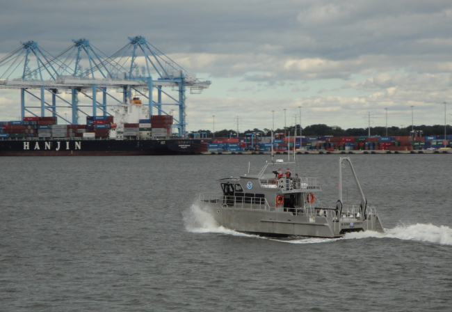 NOAA survey launch BAY HYDROGRAPHER underway at container piers atPortsmouth, Virginia, within hours of Sandy's departure