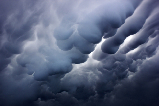 Mammatus clouds form underneath the anvil of a severe thunderstorm