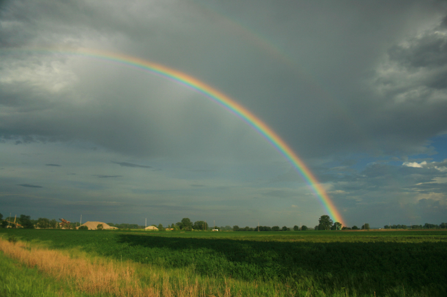 A beautiful rainbow graces the Iowa countryside