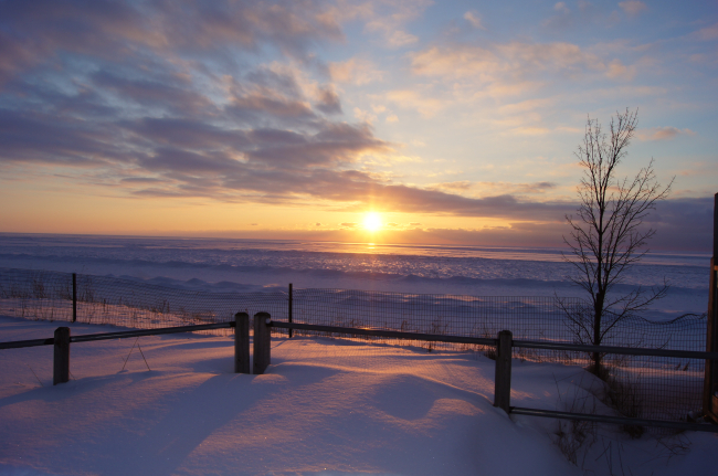 Sunset over frozen Lake Michigan