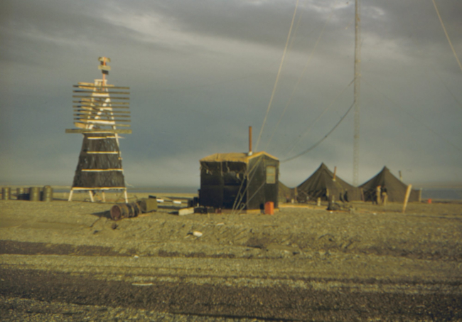 Shore camp with geodetic signal tower and Shoran electronic navigation stationtower