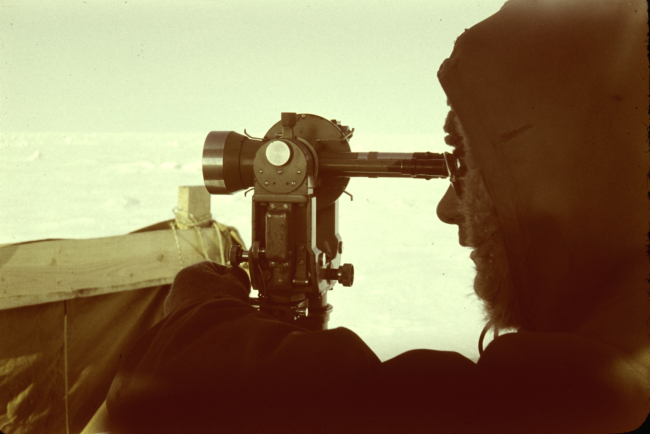 Lieutenant Don Jones observing angles with a T-3 theodolite