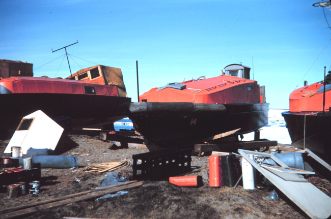 Survey launches at Tigvariak Island ready for a summer season of workBoats painted orange for visibility in Arctic waters
