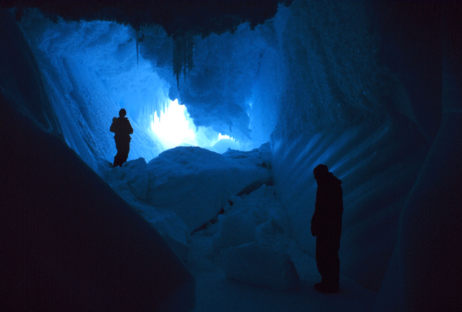Ice stalactites and columnar appearing sides within the cave at Erebus Glaciertongue