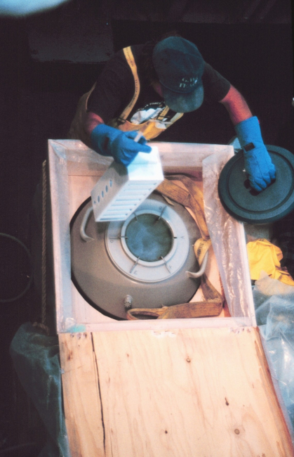 Immersing specimen material in liquid nitrogen to preserve for future studies