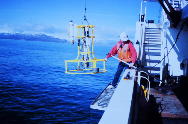 Conductivity-Temperature-Depth rosette being recovered on a rare calm day inwestern Alaska waters