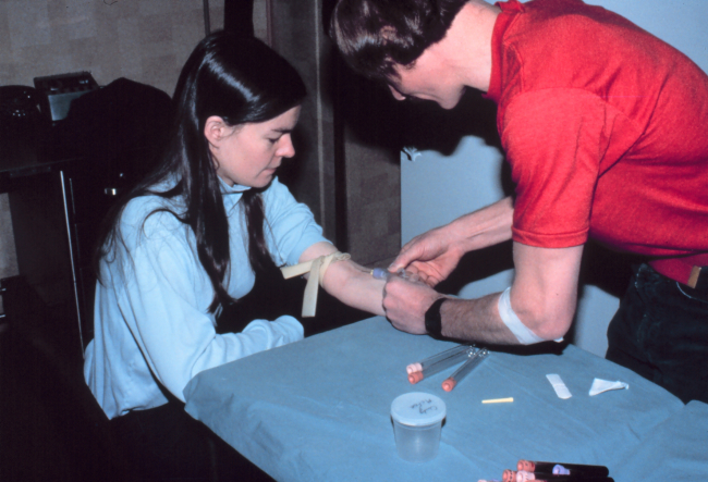 Lieutenant Cindy McFee having blood drawn as part of medical experiment