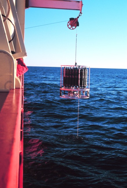 Conductivity-Temperature-Depth (CTD) rosette and water sample bottles beingdeployed from Baltic Room on the NATHANIEL B