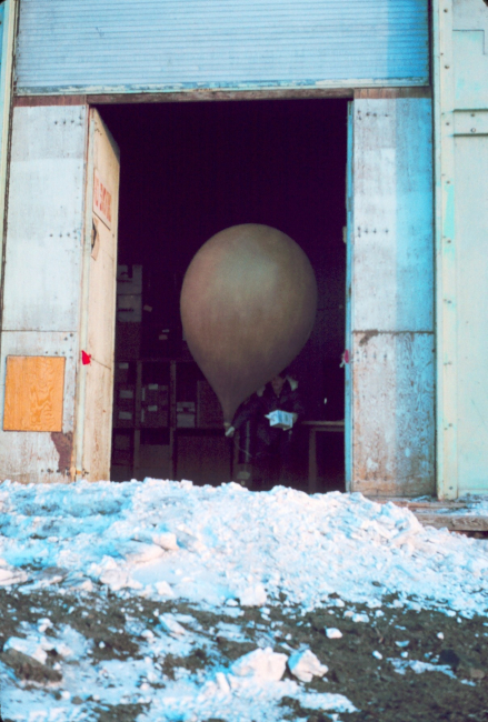 Preparing a meteorological balloon for launching at McMurdo Station