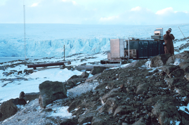 Scientific equipment at Palmer Station with a glacier front in the background