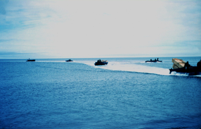 Navy reservists shuttling survey crew's annual supplies ashore with WaterBuffalo from an LST of the Barrow Expedition (BAREX)