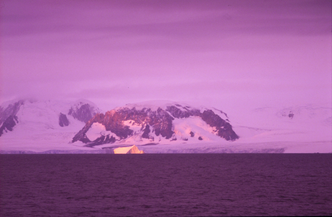 Iceberg highlighted by the sunrise