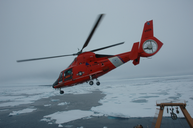 US Coast Guard Cutter HEALY operates with a compliment of twoCoast Guard HH-65B Dolphin Helicopters in addition to Healy's normal equipmentand crew