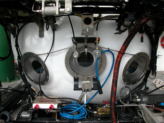 A closeup of the three viewports on the front of the PISCES V submersiblewhich was the main vehicle used to explore the submarine volcanoes of theKermadec Arc