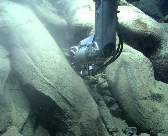 Quest 4000 ROV collects a rock sample among pillow lava at Mata Ua