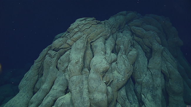 A haystack - steeply sided eruptive vent with very long, stringy pillowsflowing out