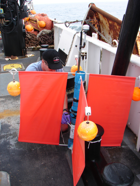 An improvised drifter buoy that minimizes wind surface and maximizes effect ofwater on sails