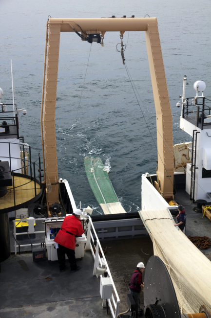 Setting a mid-water trawl on the NOAA Ship PISCES