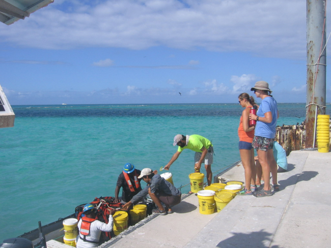 The monk seal research team packing up after finishing the season's work atFrench Frigate Shoals