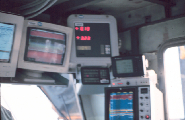 Navigational readouts and displays on the bridge of a fisheries researchvessel ca